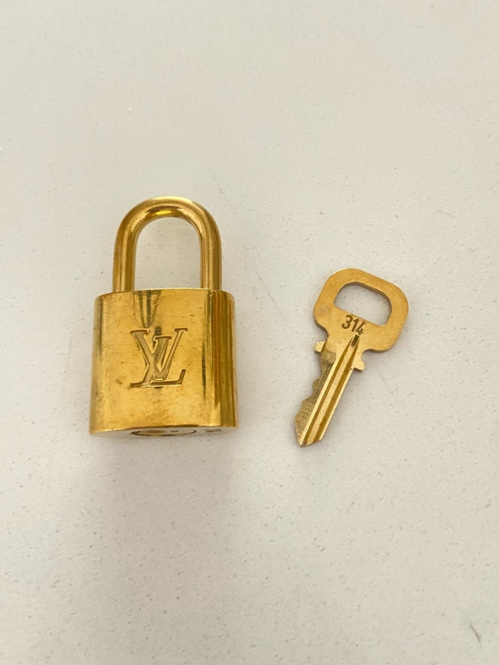 Louis Vuitton Gold Padlock and Key Set #314